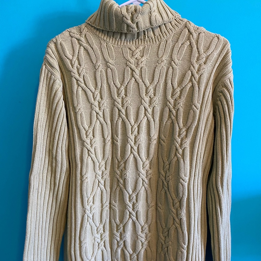 Green turtleneck sweater